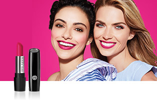Close up of two women smiling and wearing lipstick in the shade that benefits Mary Kay initiative Pink Changing Lives. 